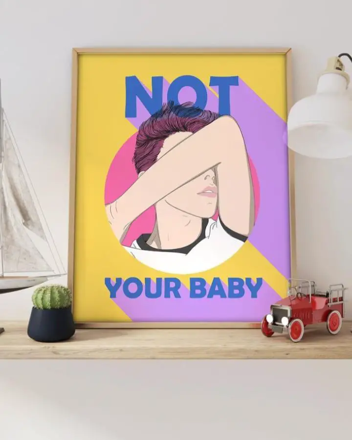 Colorful pop art print from @longadodecor featuring yellow background and purple shapes with rebellious text message.