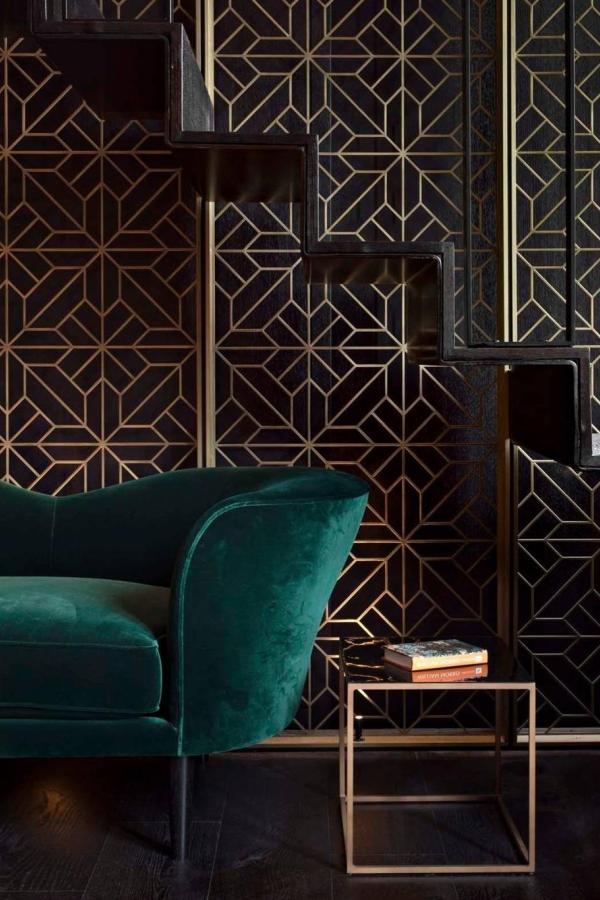 Emerald sophistication joins geometric glam enhancing black & gold living room ideas.