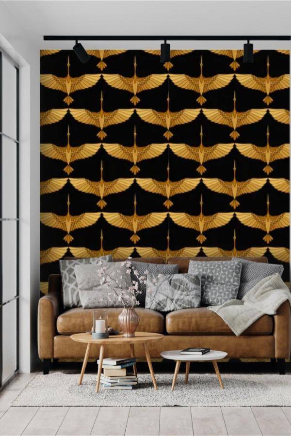 Elegant black & gold living room ideas with sophisticated golden crane accents.