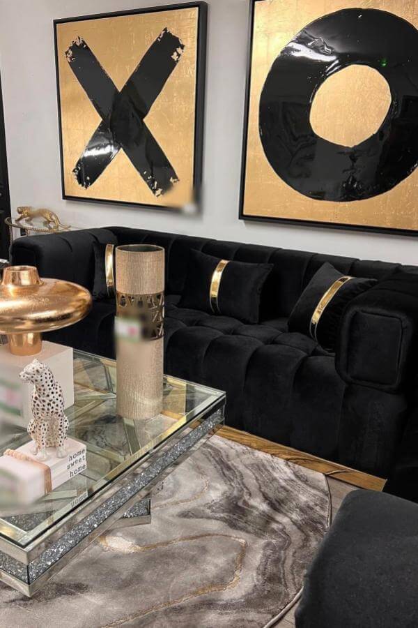 Abstract elegance electrifies luxe space with black & gold living room ideas.