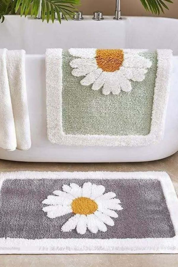 Vibrant floral bath rug enhances boho bathroom ideas with style.