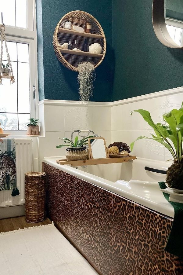 A leopard print bathtub adds flair to boho bathroom ideas.