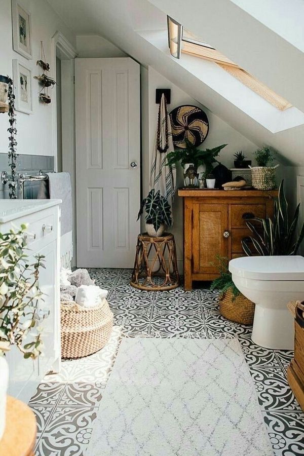 Boho bathroom with patterned floor tiles showcasing boho bathroom ideas.