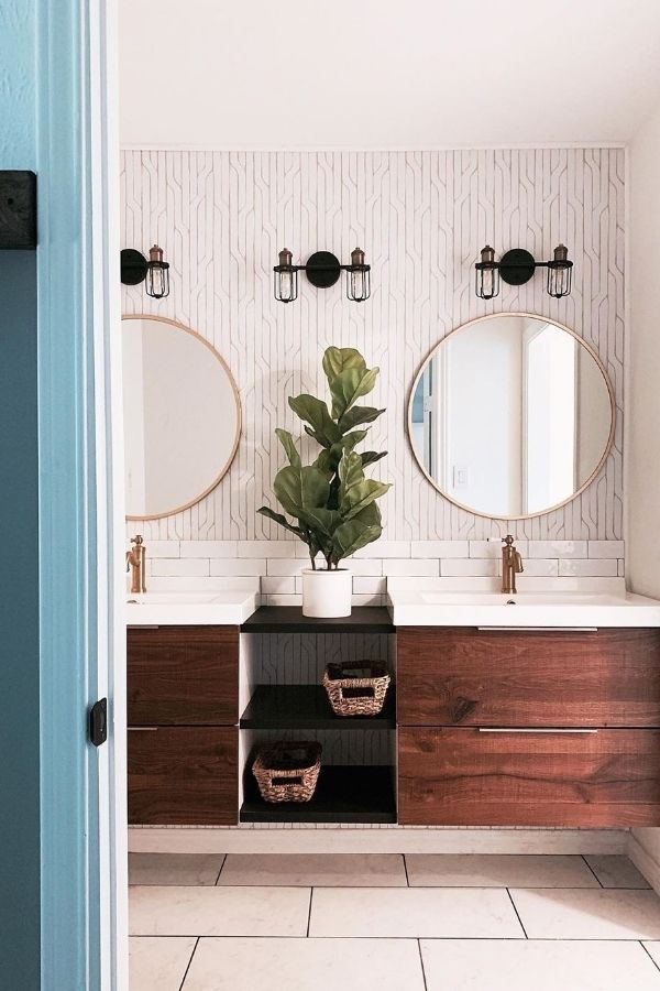 Boho bathroom with elegant round mirrors and stylish decor inspiration. #bohobathroomideas