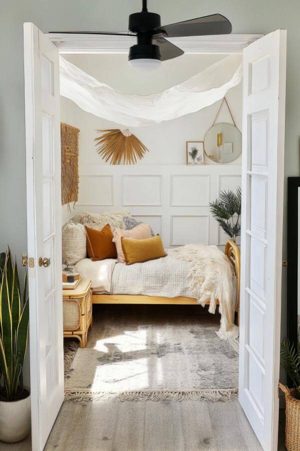 Dreamy pastel canopy from a whimsical sanctuary in an eclectic teenage bedroom, featuring cozy, boho-inspired designs and warm textures.