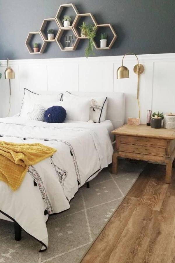 Colorful hexagon shelf from @restore_arizona enhances a boho teenage girl bedroom with chic and creative organization vibes.