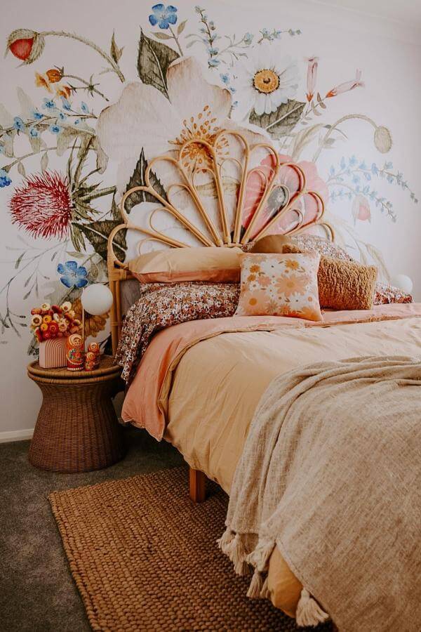 Whimsical florals complement the boho teenage girl bedroom from @homeofthewildlings, creating a serene and enchanting atmosphere.