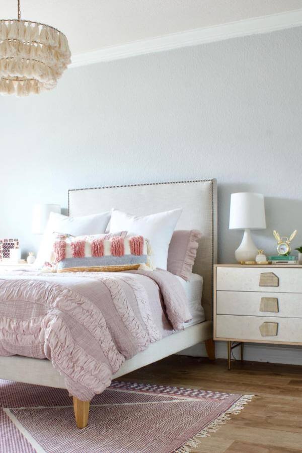 Whimsical ruffled bedding from @firefinish_interiors. Ideal for creating cozy, boho teenage girl bedroom aesthetics.