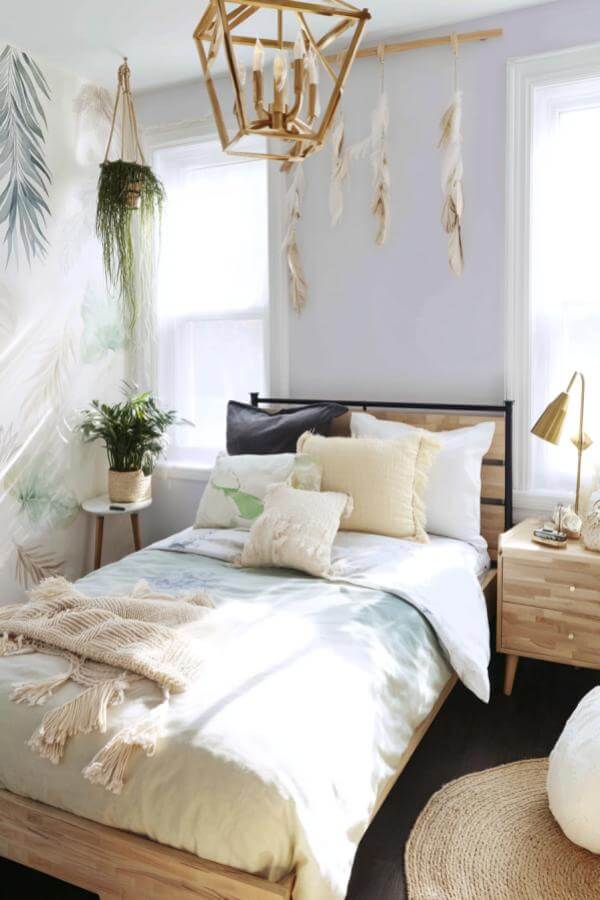 Dreamy feather accents illuminate the serene, nature-inspired decor.