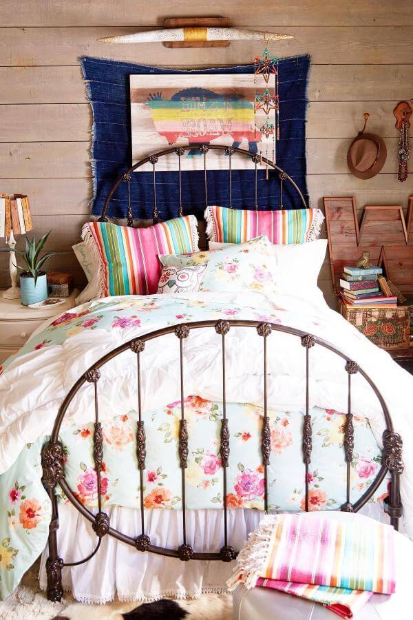 Colorful striped bedding from @junkgypsy. Adds vibrant charm and warmth to a rustic boho teenage girl bedroom.