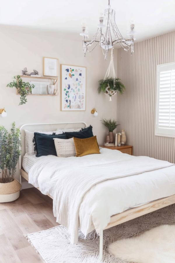 Woven rattan chandelier from bohemian decor ideas, casting a warm glow in a stylish teen girl's bedroom.