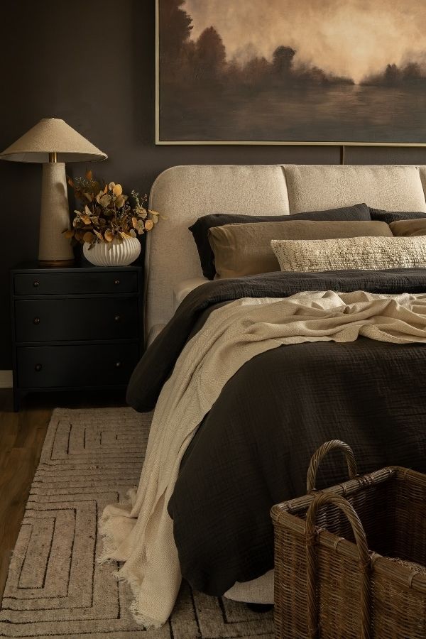 Warm, inviting bedroom with moody brown tones and soft lighting.