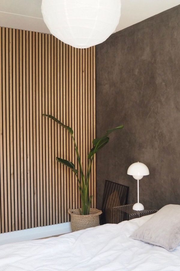 Textured fluted wall with soft brown velvet effect, creating elegance.