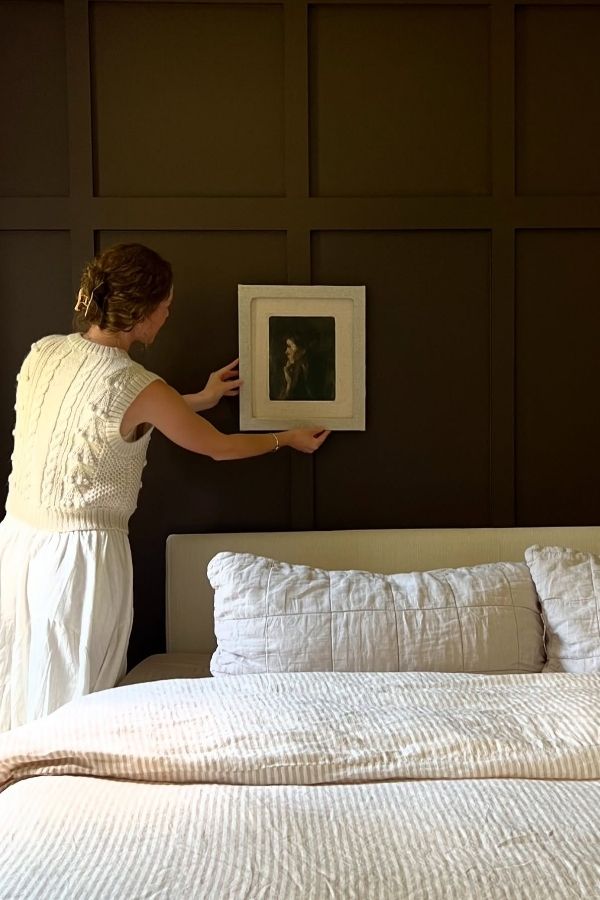 Luxurious bedroom featuring beige tones, plush bedding, and elegant decor.