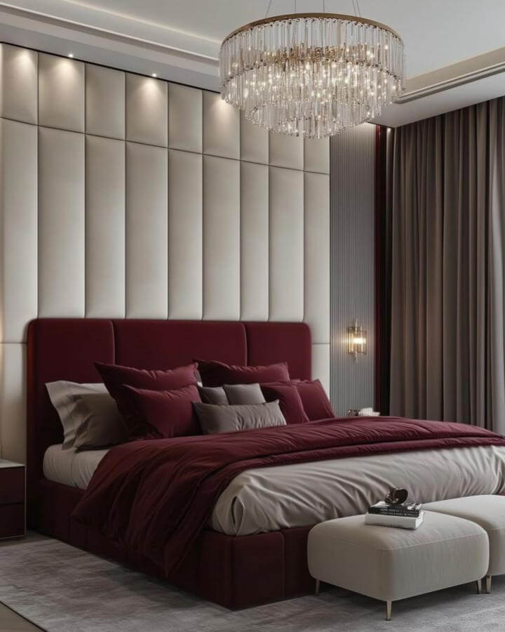 Cherry red velvet bed and bedding with neutral padded wall and curtains from @linajabre_interiors showcasing cherry red bedroom ideas in a stylish modern setting.