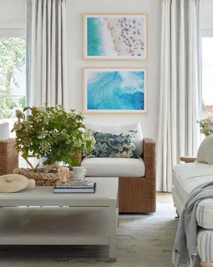 Framed ocean photography wall art from @madisonnicoledesign. Two coastal prints showing turquoise waters and beach scenes.