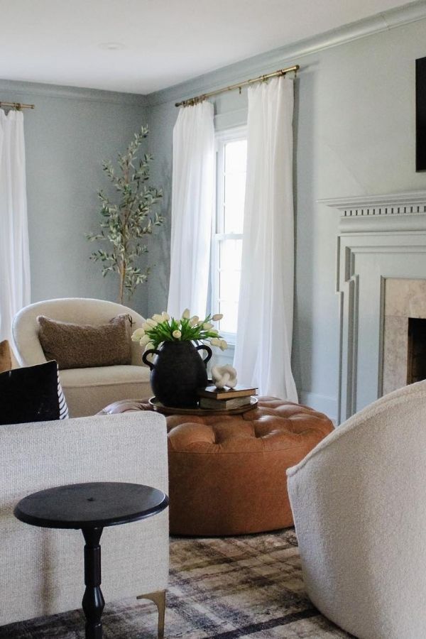 Elegant colonial living room with neutral tones and classic furnishings.