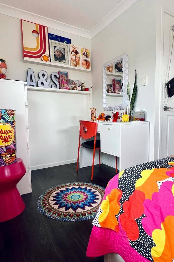Vibrant mandala rug from @amilita_designs enhances colorful teenage bedroom with bold patterns.