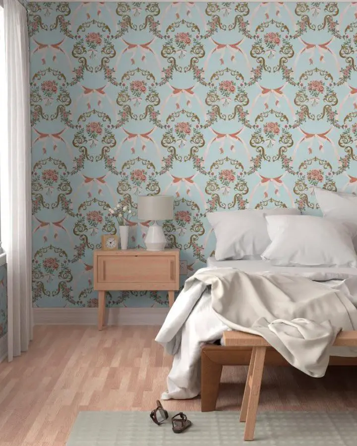 Floral patterned accent wall from @stephgordoart featuring pink roses and coral bows on blue background.