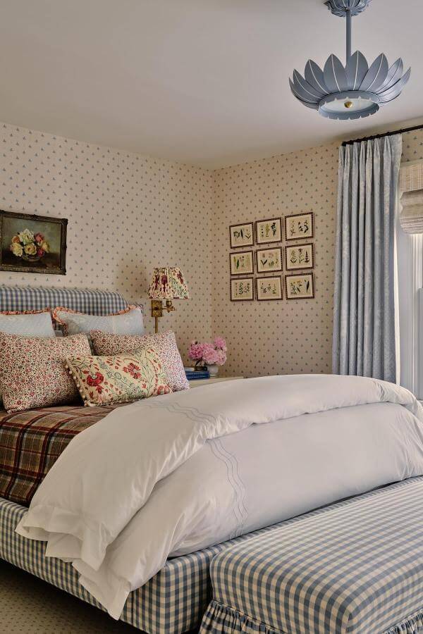 Charming mixed pattern vintage florals bedding from @katierosenfeld. Cozy, warm cottagecore aesthetic bedroom.