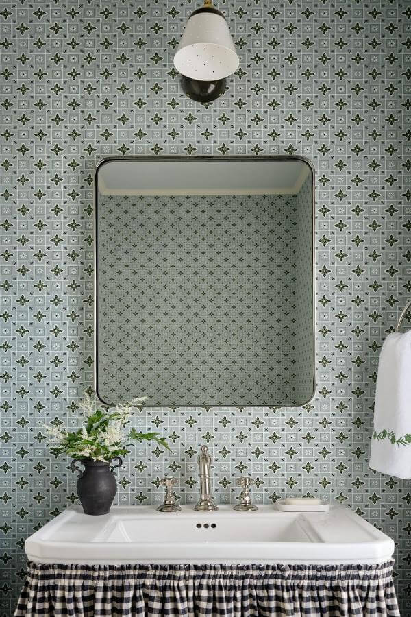 Charming gingham fabric sink skirt from @katierosenfeld. Adds whimsical touch to cozy kitchen decor.