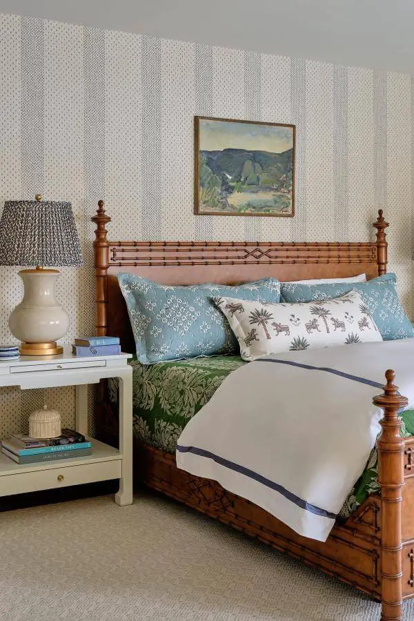 Richly carved wooden bedframe from @katierosenfeld. Vintage charm perfect for a cozy cottagecore bedroom retreat.