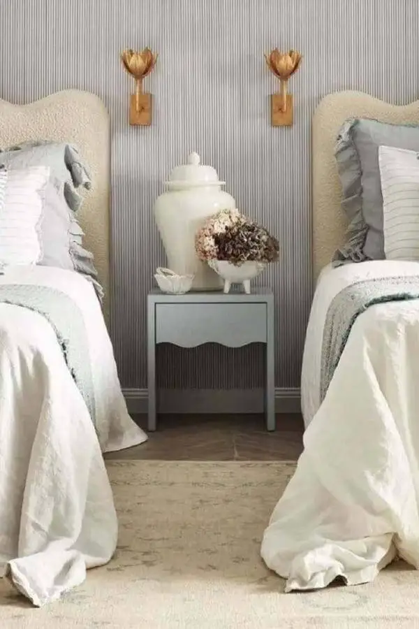 Honey-hued flower sconces in chic cottage bedroom from @halemercantileco, capturing cozy cottagecore bedroom ideas.