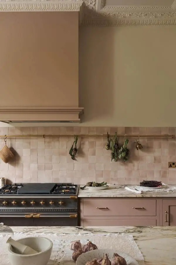 Cream kitchen with decorative crown molding from @emma__ainscough. Perfect cottagecore kitchen ideas inspiration with herb drying display.