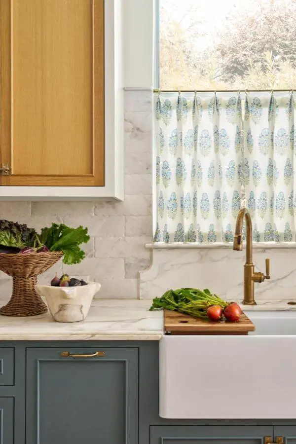 Blue floral cafe curtains from @kristinmullendesigns. Window treatment adds farmhouse charm with botanical pattern.