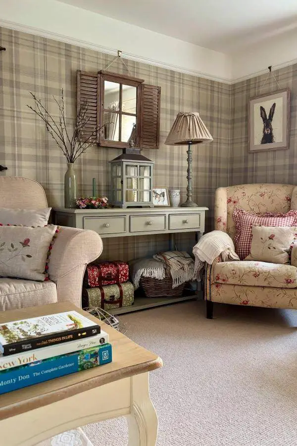 soft plaid wallpaper in cozy living room from @colleensinteriors. Adds whimsical vintage charm to cottagecore living room.