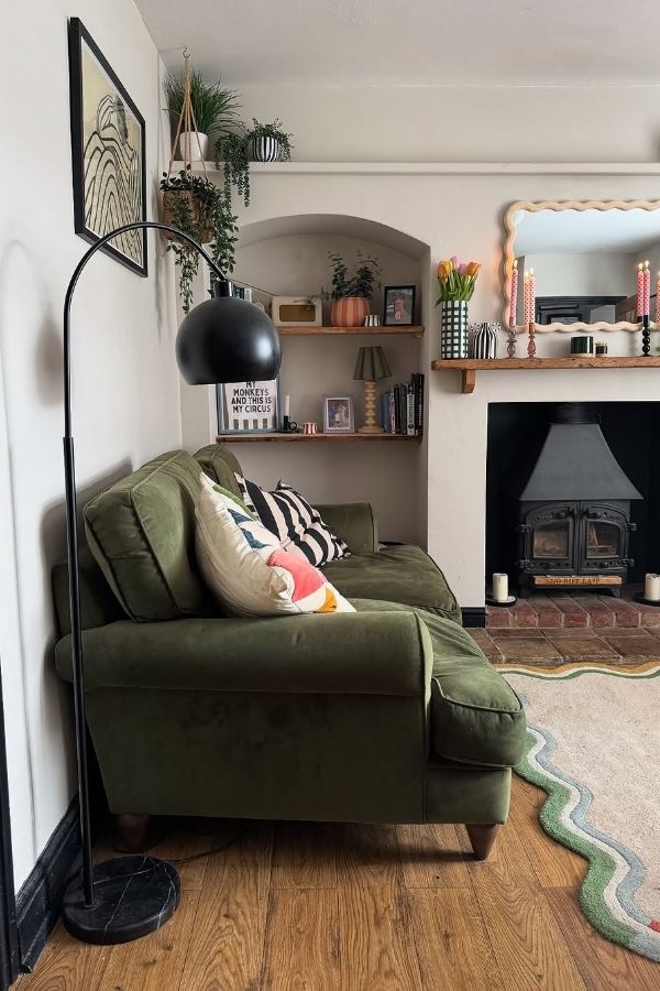 A cozy boho room featuring dusty pink accents and decor.