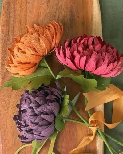 Vibrant crepe paper chrysanthemums from @liagriffith showing colorful craft ideas for adults with textured petals