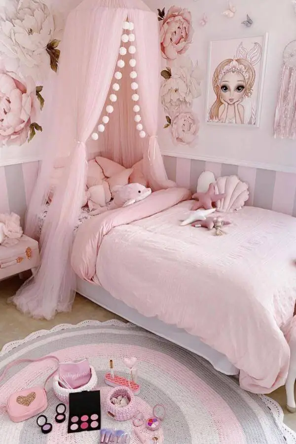 Whimsical pink canopy from @gingerandpeargifts. Enchanting addition for a fairytale magic-themed girl's bedroom.