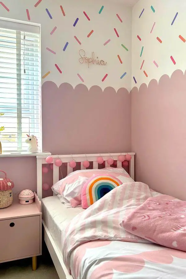 Pastel rainbow accents enhance the serenity from @stephiehome. A whimsical touch creates a sprinkled haven, perfect for cute pink bedroom ideas.