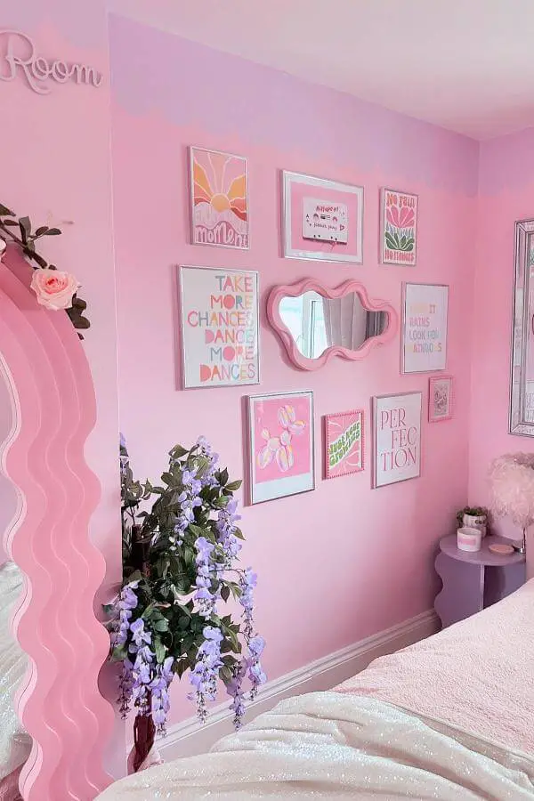Pastel pink walls from @jessysdreamhouse. Whimsical waves adorn the frame, enhancing the cute pink bedroom ambiance.