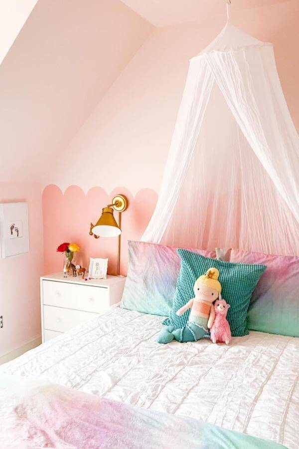 Blush-toned bedroom with draped canopy from @megantmetcalf, offering a cozy space ideal for a relaxing retreat.