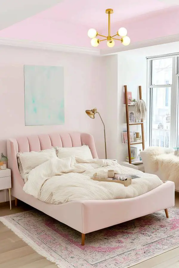 Chic blush bedframe from cute pink bedroom brings comfort vibes with minimalistic elegance.