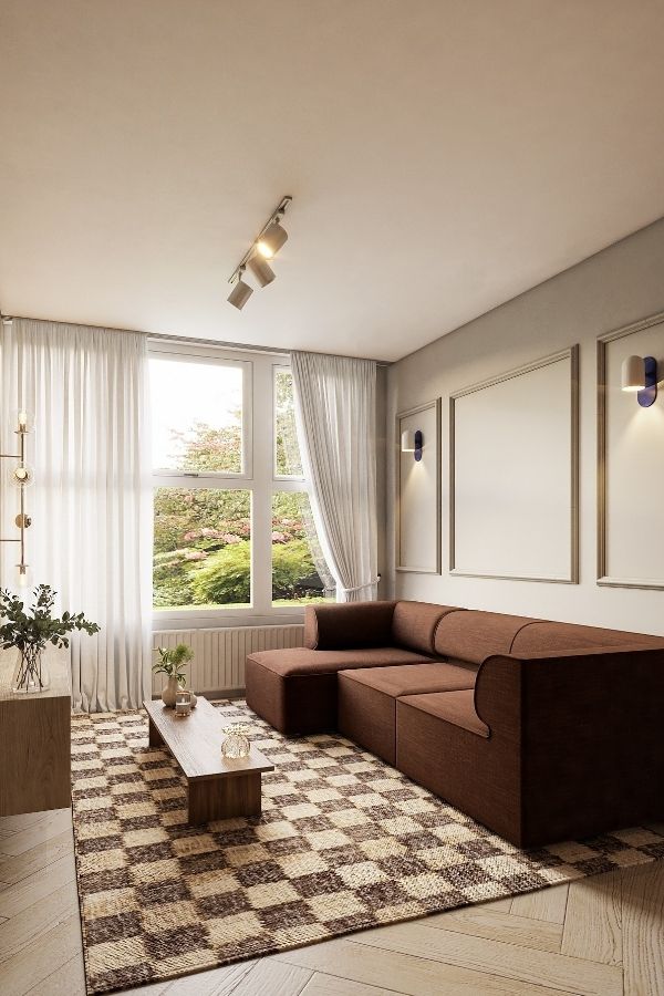 Cozy living room featuring earthy tones, wooden furniture, and plants.