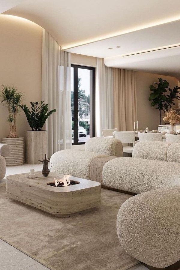 Modern living room featuring minimalistic design in soft, neutral tones.