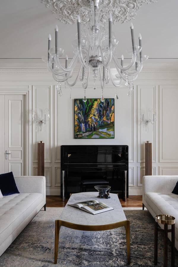 Chandelier brilliance elevates elegant living room, inspiring elegant living room ideas.