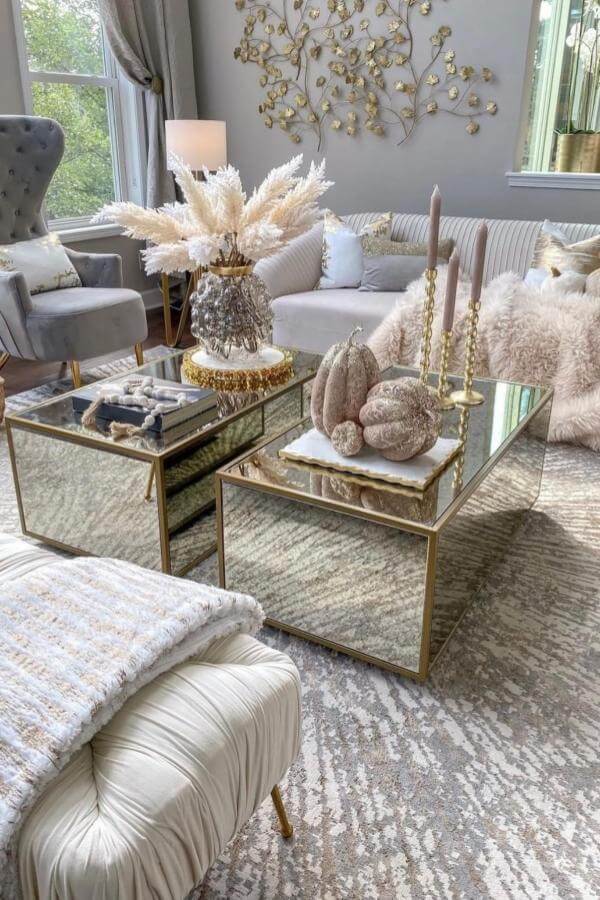 Glamorous gold accents illuminate tranquility in elegant living room ideas.