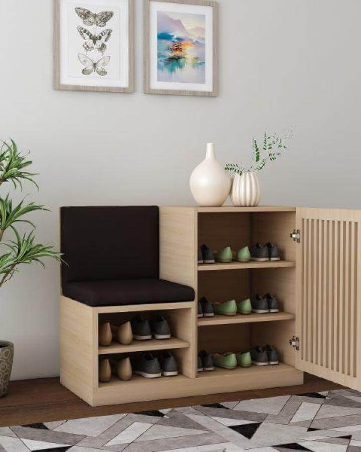 Light wood bench with black cushion and dual shoe shelving from @furnisco_official. Stylish compact storage for organized entryway spaces.