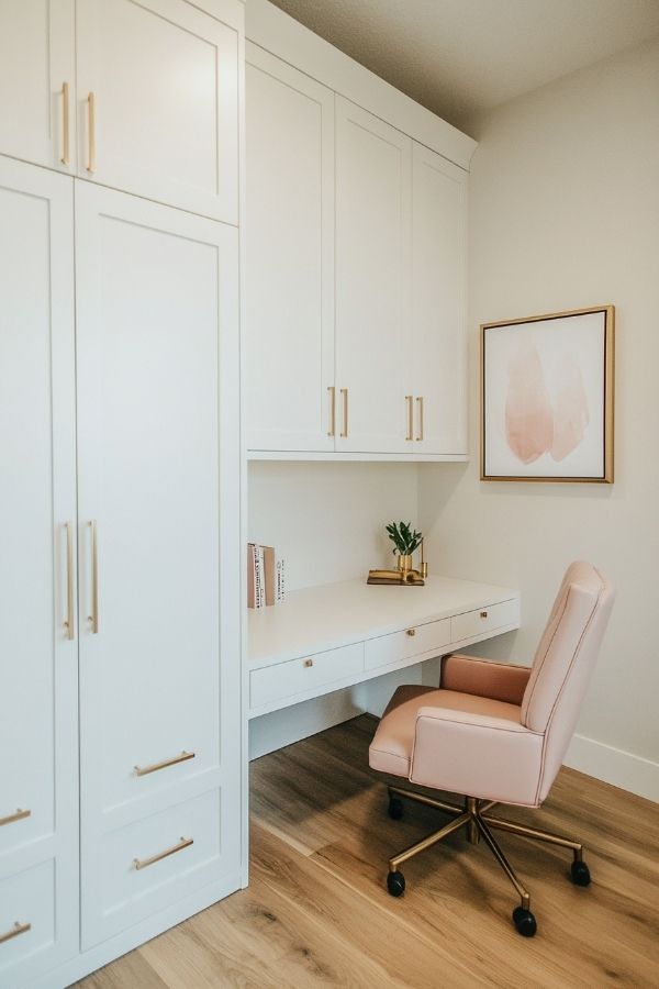 feminine home office pastel decor, cozy seating, floral accents, soft lighting