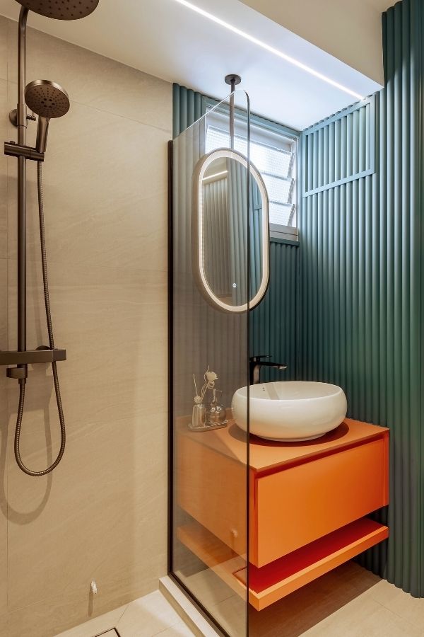 Vibrant bathroom featuring bold, colorful panels and modern design elements.