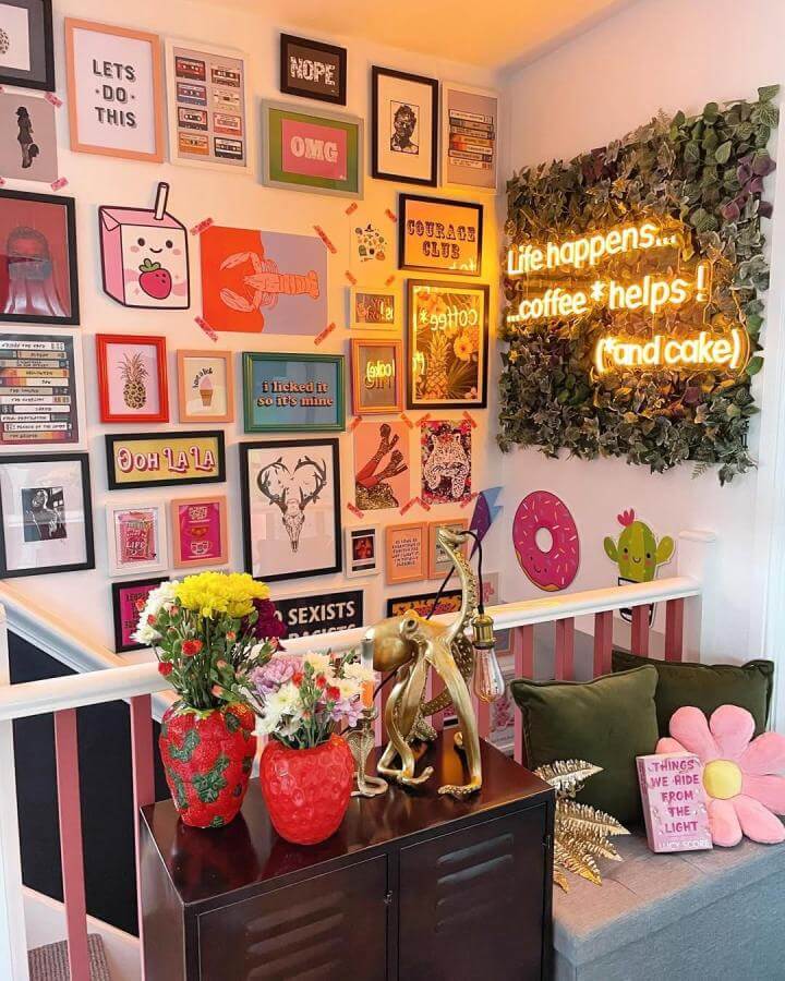 Bright colorful gallery wall with neon sign and greenery panel from @ellashausofcolour featuring playful framed art and vibrant decorative accents.