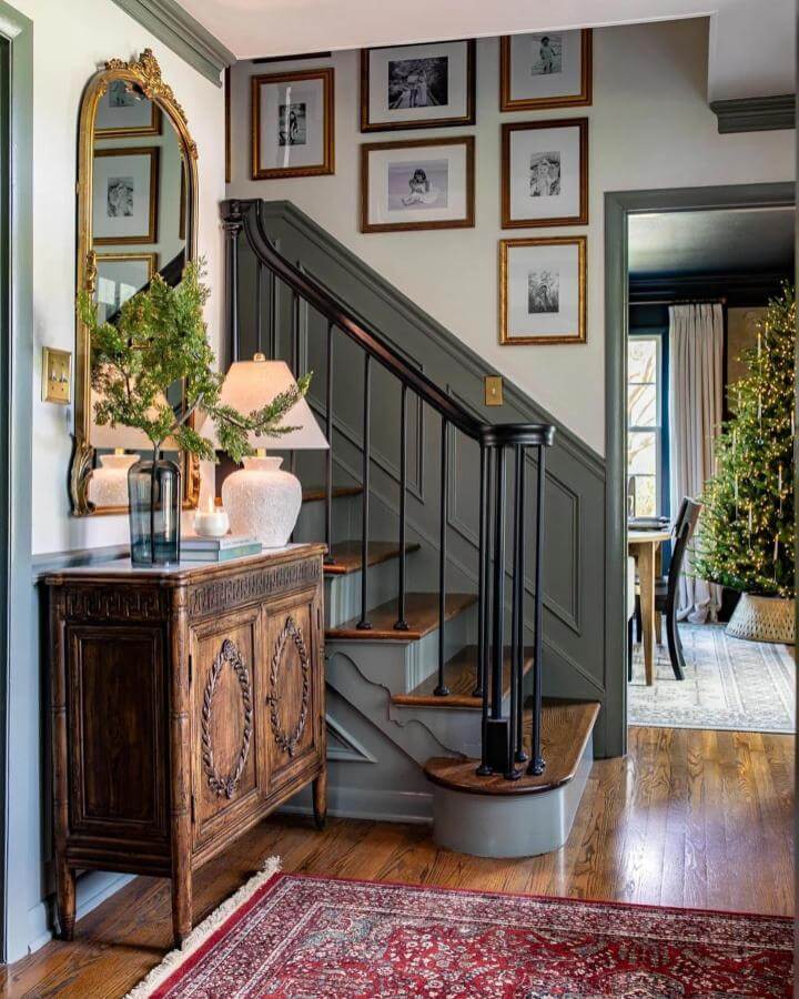 Elegant gold-framed black and white photos in a staircase gallery wall ideas from @blesserhouse showcasing timeless charm and cozy vibes.