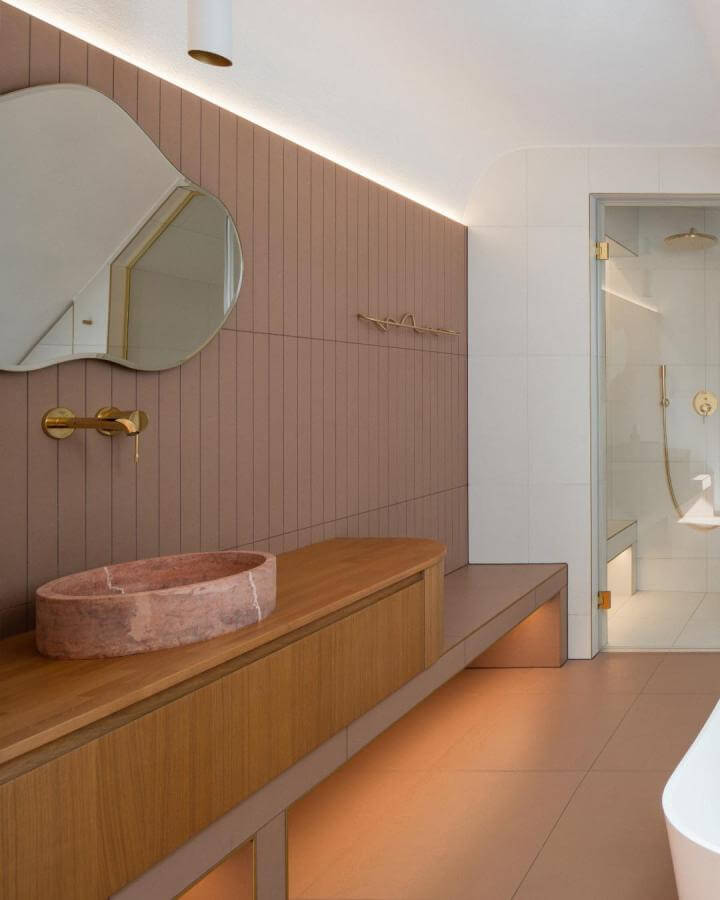Dusty pink paneled bathroom with rose marble sink and golden fixtures from @grohe_uk showcasing girly bathroom ideas.
