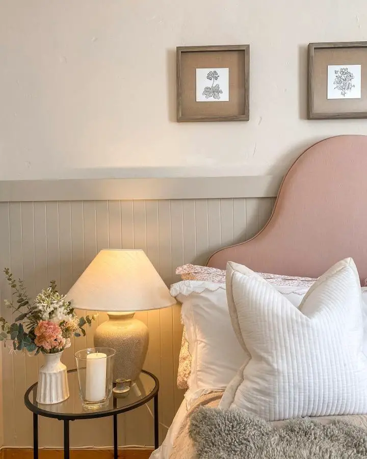 Cream wainscoting bedroom from @our_little_victorian. Perfect girly bedroom ideas for women with rose headboard and botanical prints.