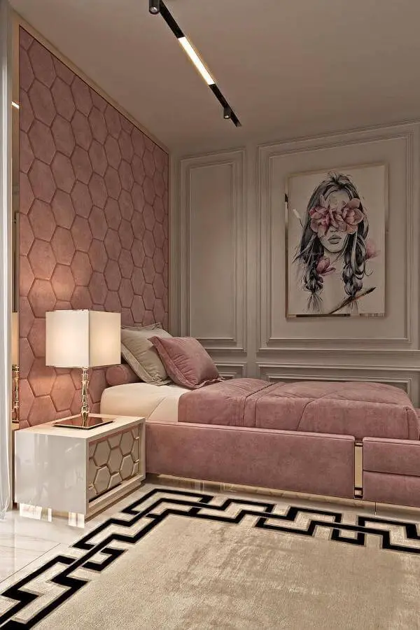 Luxurious mauve velvet headboard from @vaneshomedecor. Hexagonal tufted pattern with matching bedding and gold accents.