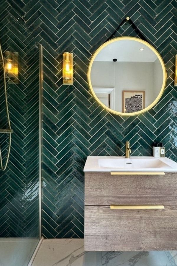 Herringbone Green Bathroom, golden mirror, elegant decor, inspiring green bathroom ideas.